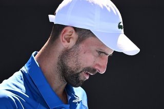 Novak Djokovic loin du compte contre Matteo Berrerttini. KEYSTONE/EPA/JAMES ROSS